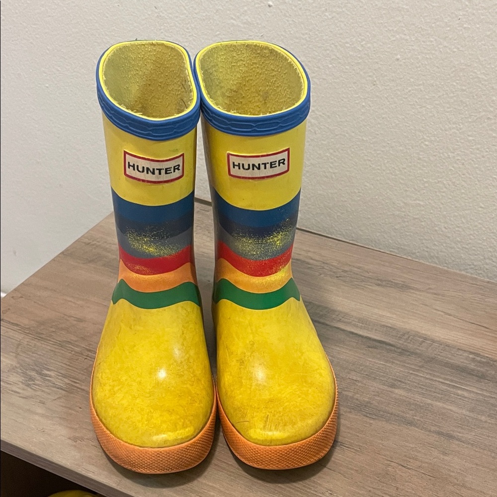 Well loved Hunter Kids' Vibrant Yellow and Blue Striped Boots